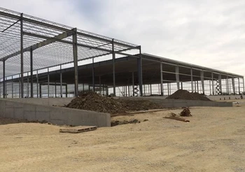 The Butler Steel frame of a warehouse bare of walls or windows.